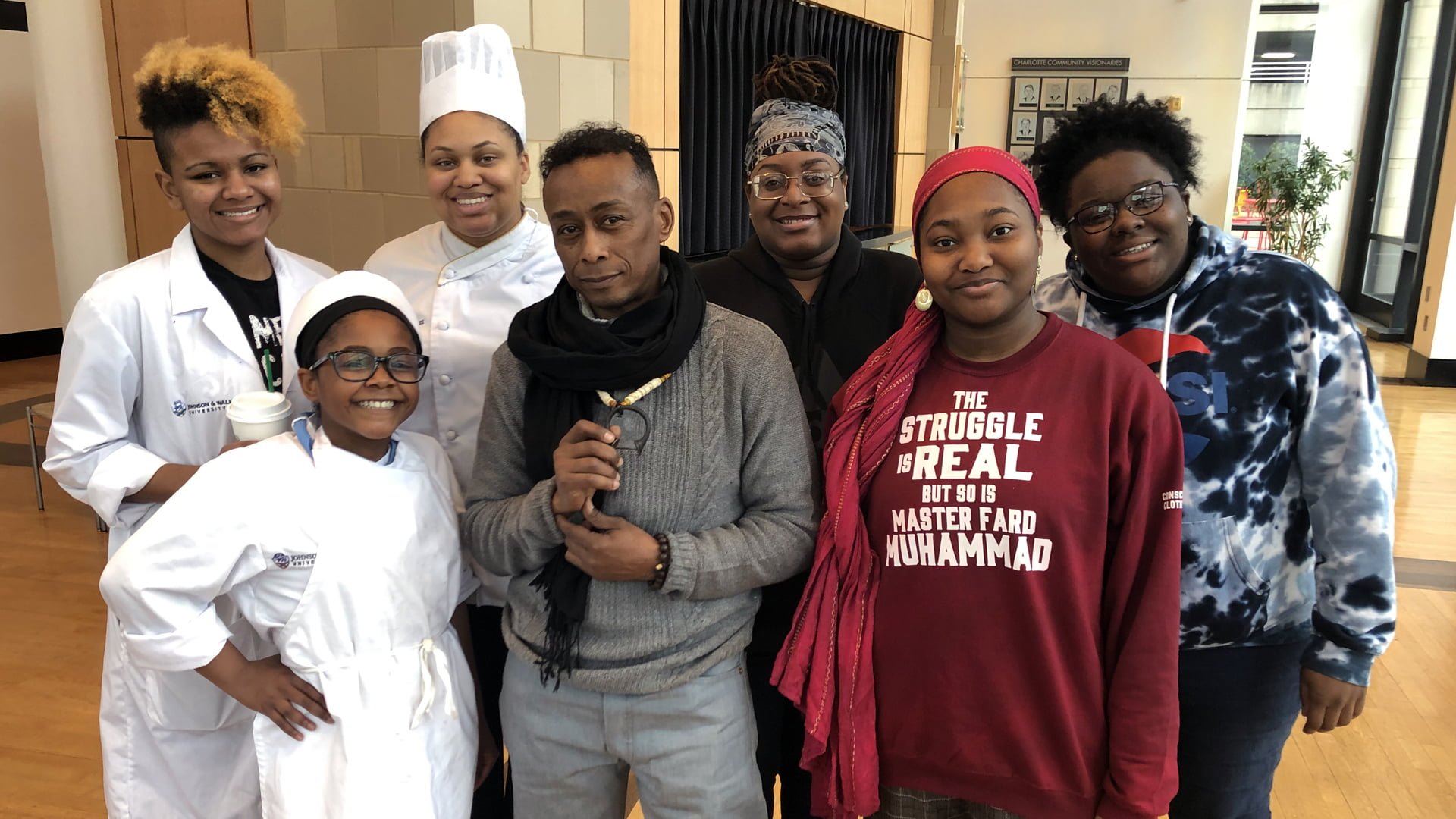 Professor Griff of Public Enemy (center) with students at JWU Charlotte.