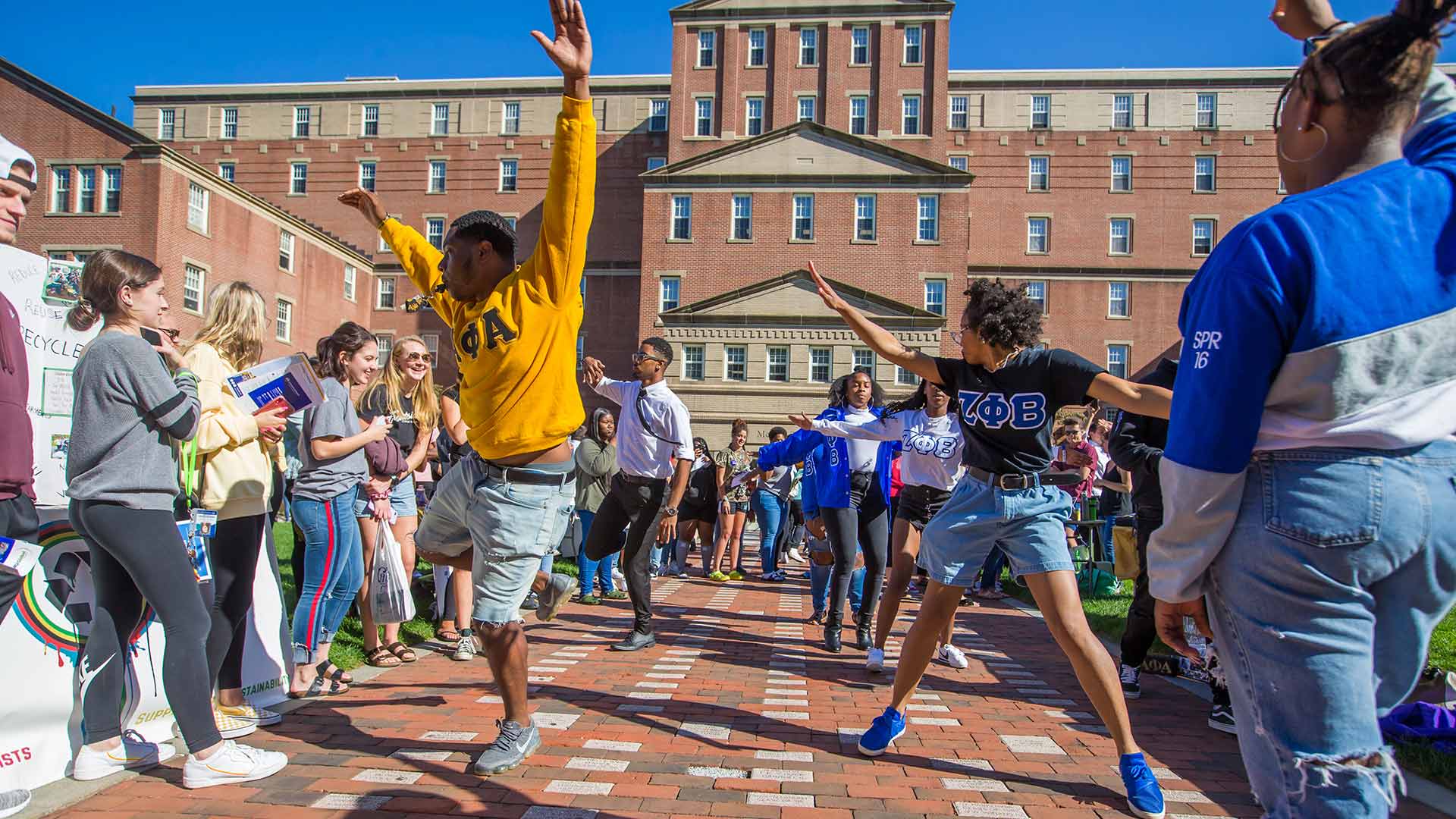 Group of students dancing on Gaebe Commons.