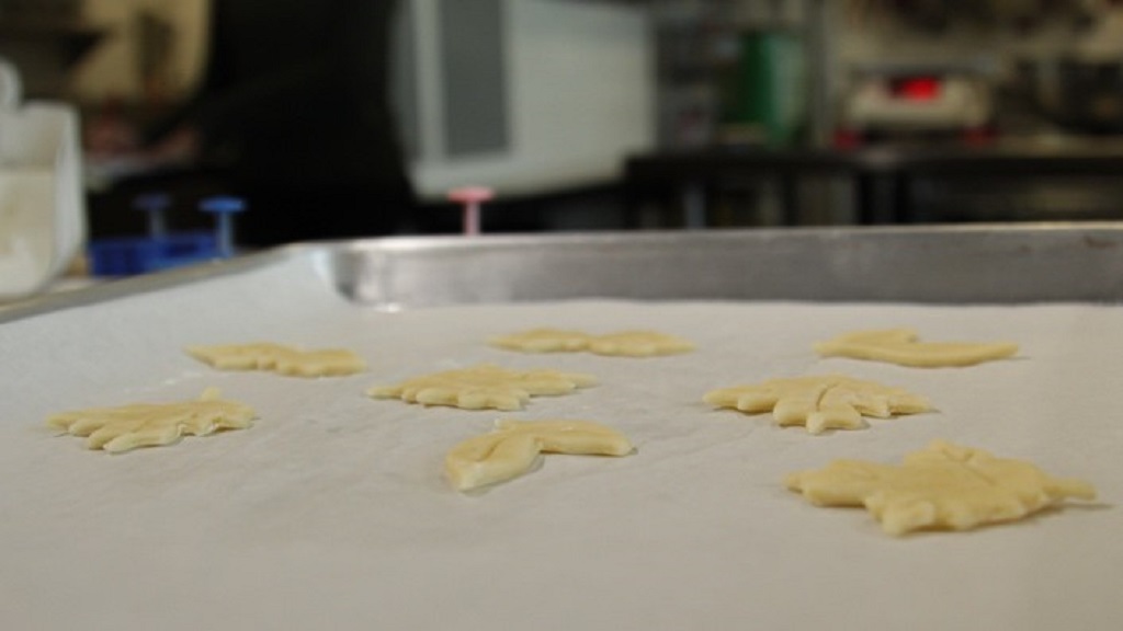 Pie dough shapes on sheet pan