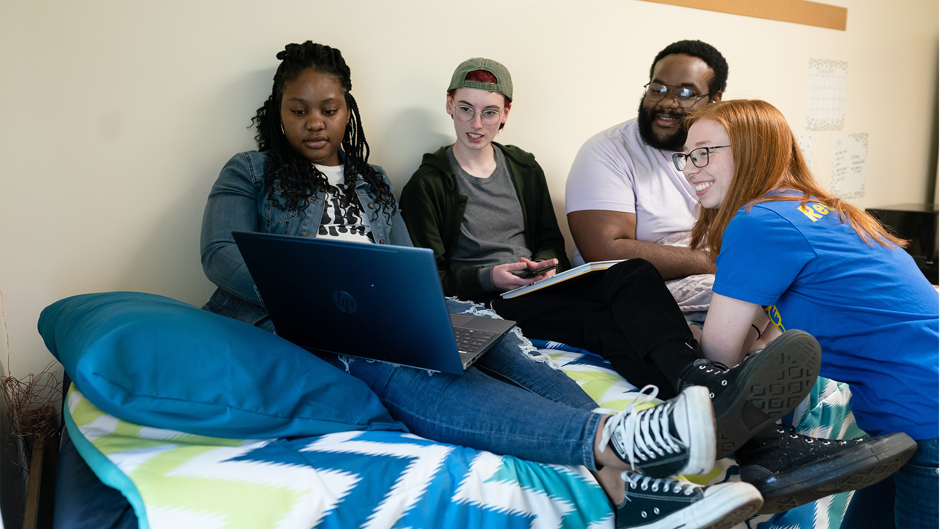 Students in a dorm on Charlotte campus