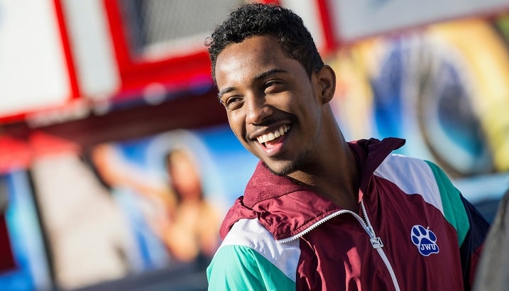 A male student smiling