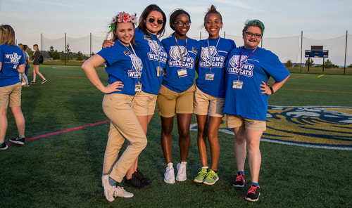 Group of 4 Orientation leaders at JWU Providence's Harborside Campus.