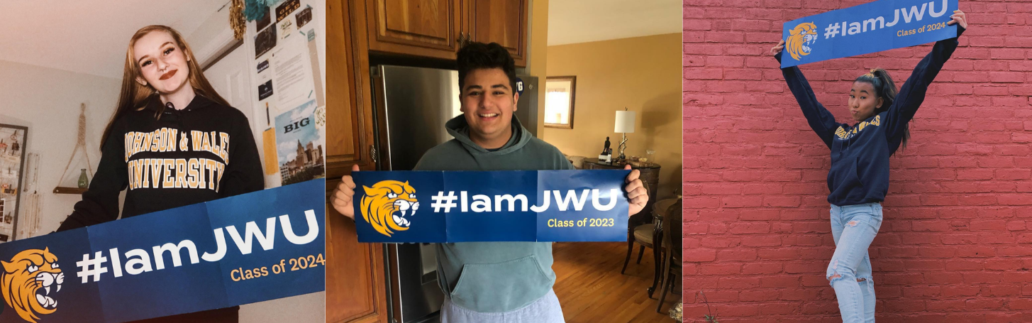 Students holding JWU banners