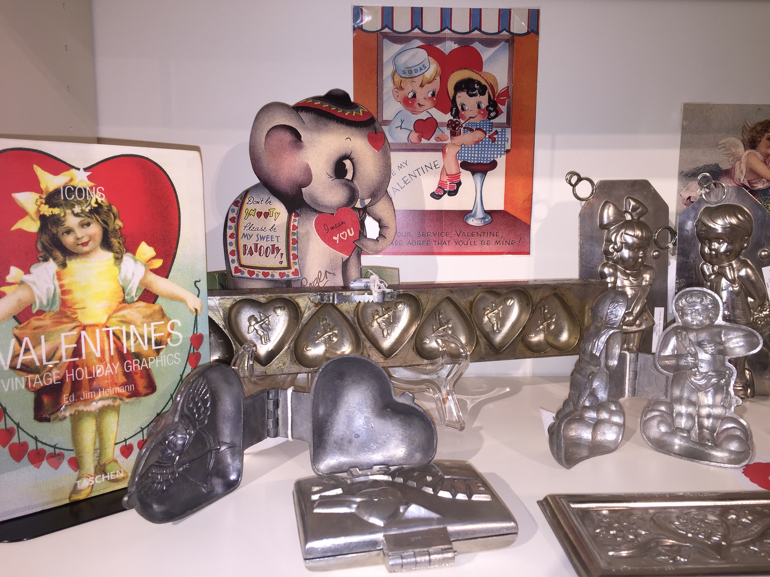 Vintage candy molds and ephemera on display