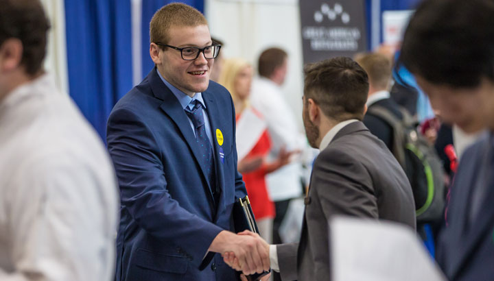 students shaking hands