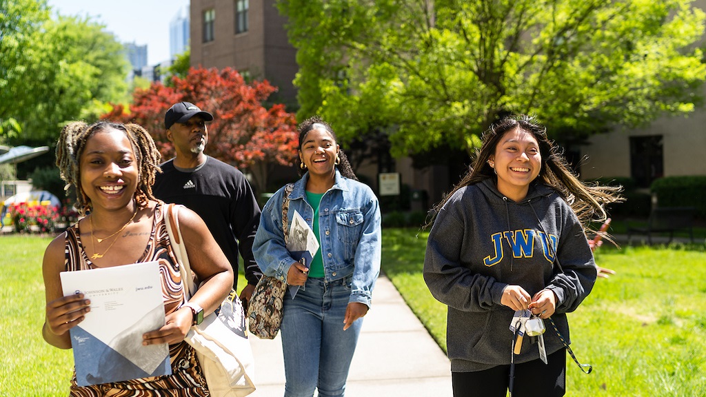 family taking tour of jwu charlotte