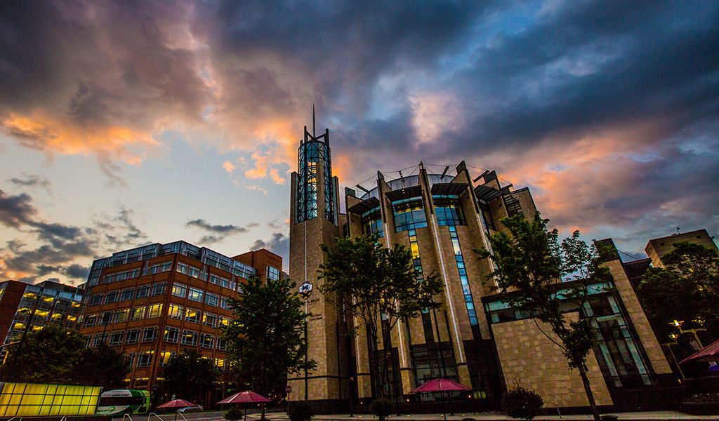 Charlotte Academic Center with sunrise in background