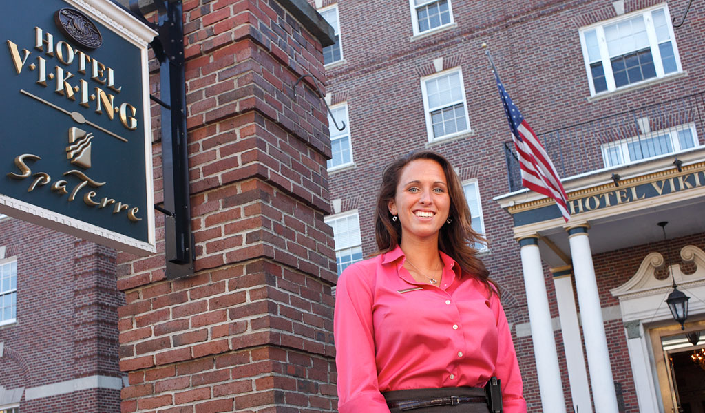 woman in front of hotel