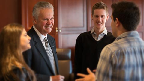 Chancellor John J. Bowen speaking with students