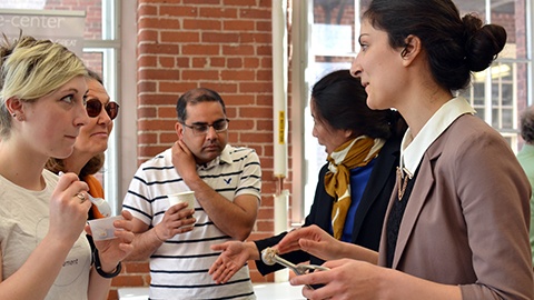 Student entrepreneurs pitch their idea at the JWU One Million Cups event