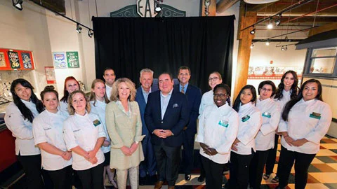 2015 Emeril Lagasse Scholars flanking President Mim L. Runey, LPD, Chancellor John J. Bowen '77, Tournament Chairman Stephen J. Caldeira '07 Hon. and Chef Emeril J. Lagasse '78, '90 Hon.