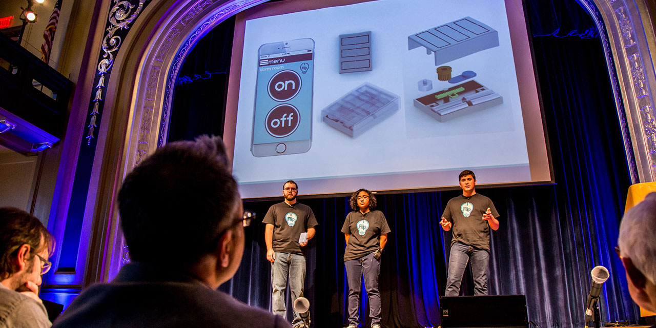 Student team presenting their business concept at Sharkfest