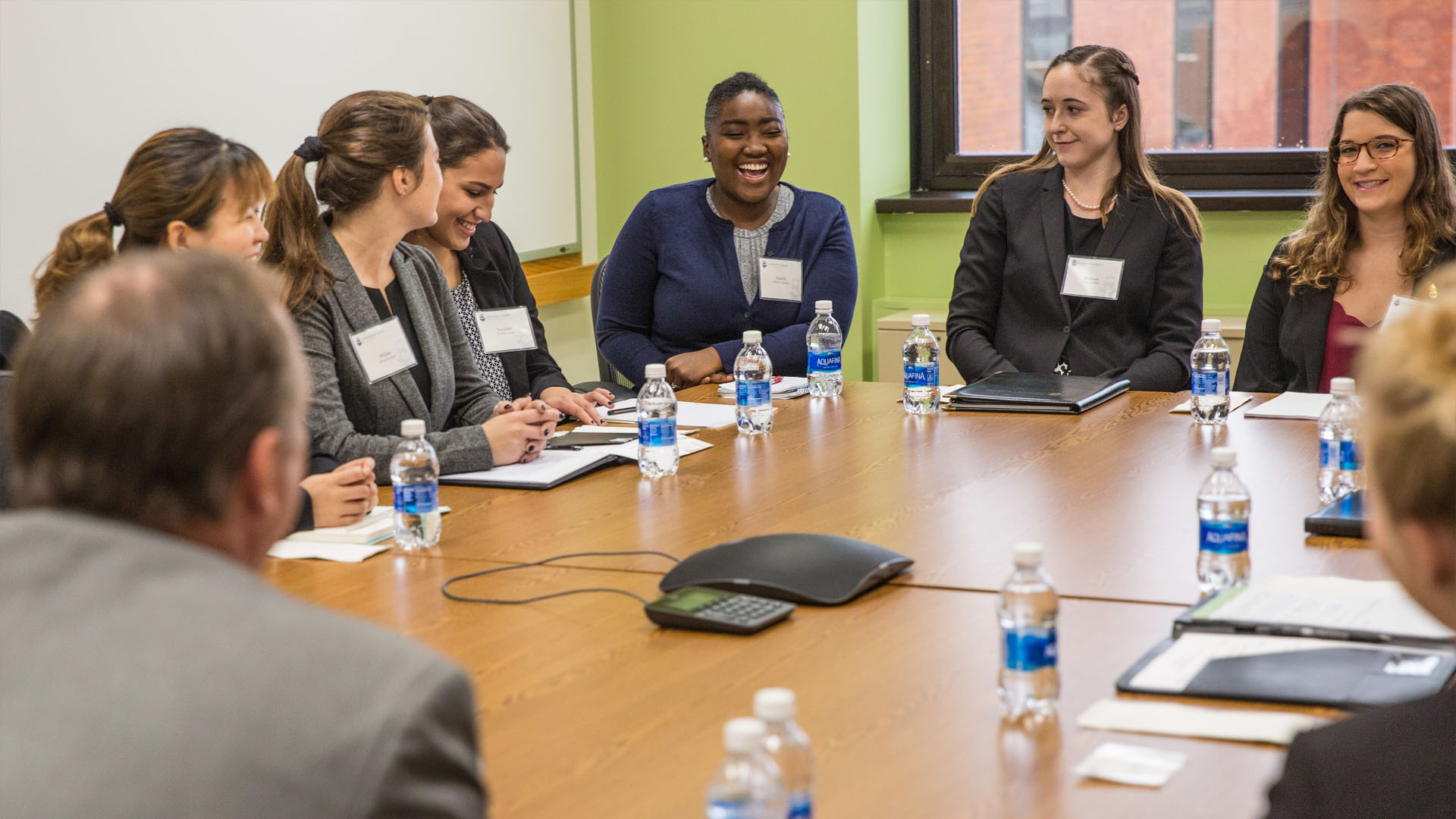 Students participate in a roundtable session as part of Hilton Day.