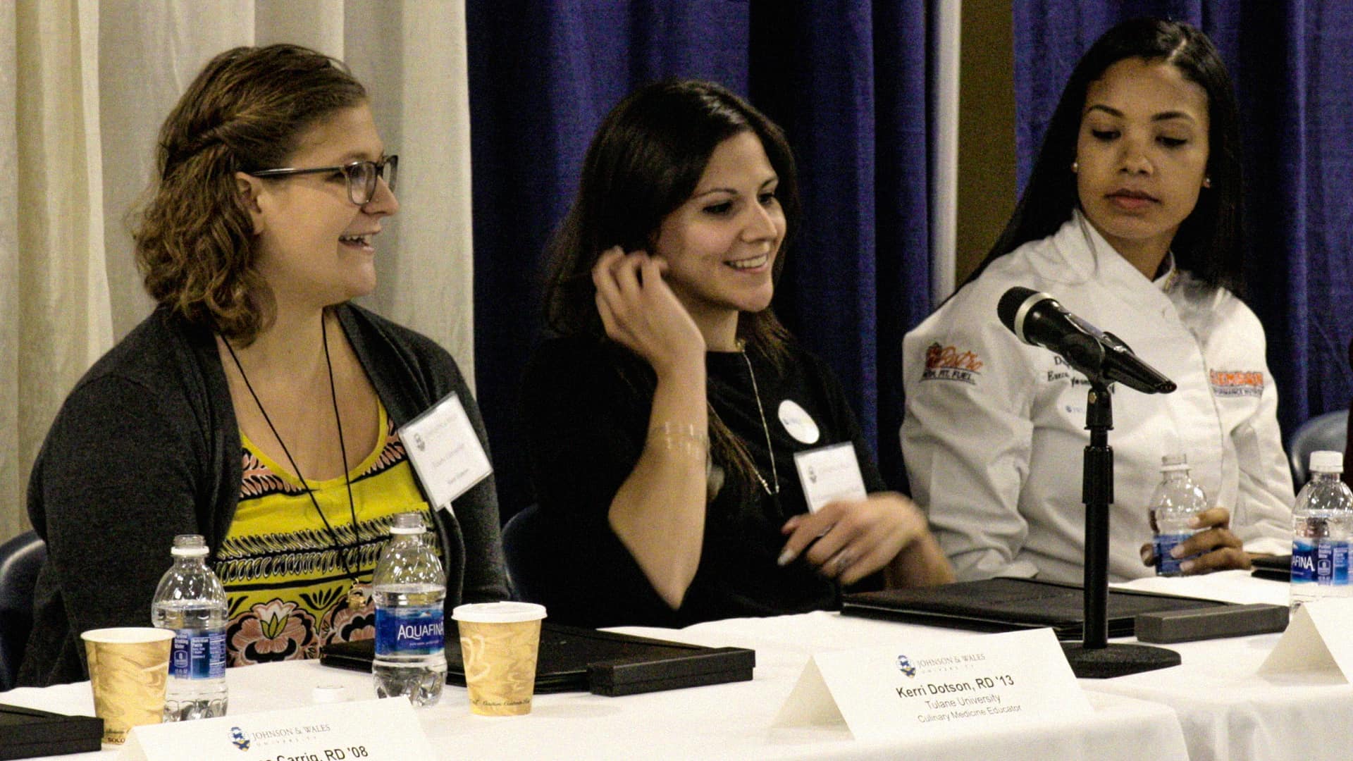 Panelists giving advice and answering students questions.