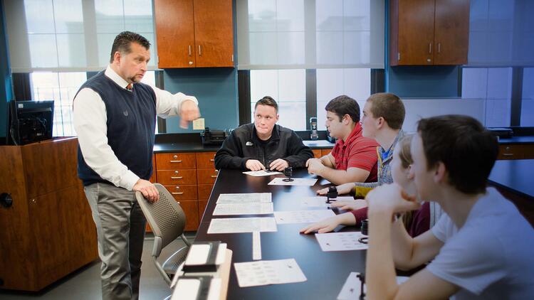 Criminal Justice Department Chair Paul Sylvestre with students in the classroom