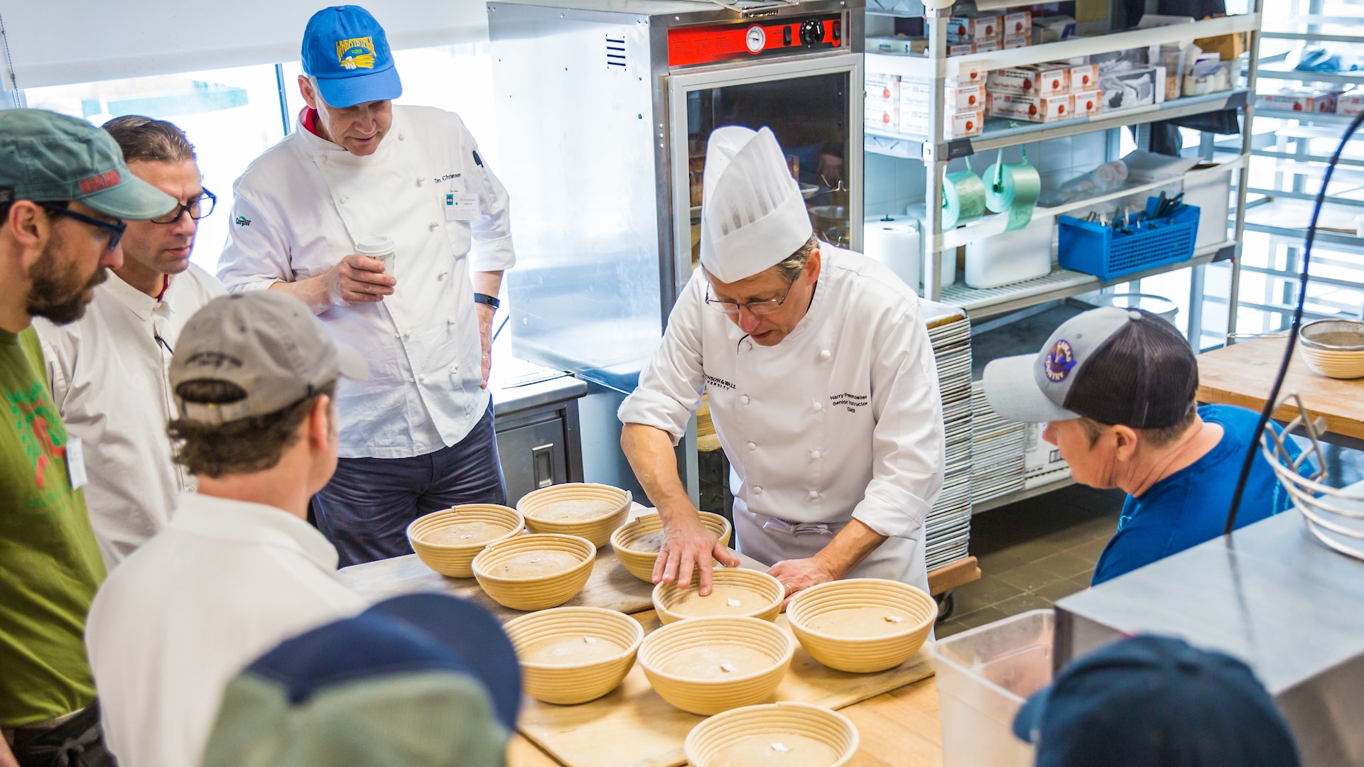 Chef Peemoeller giving a bread making demonstration.