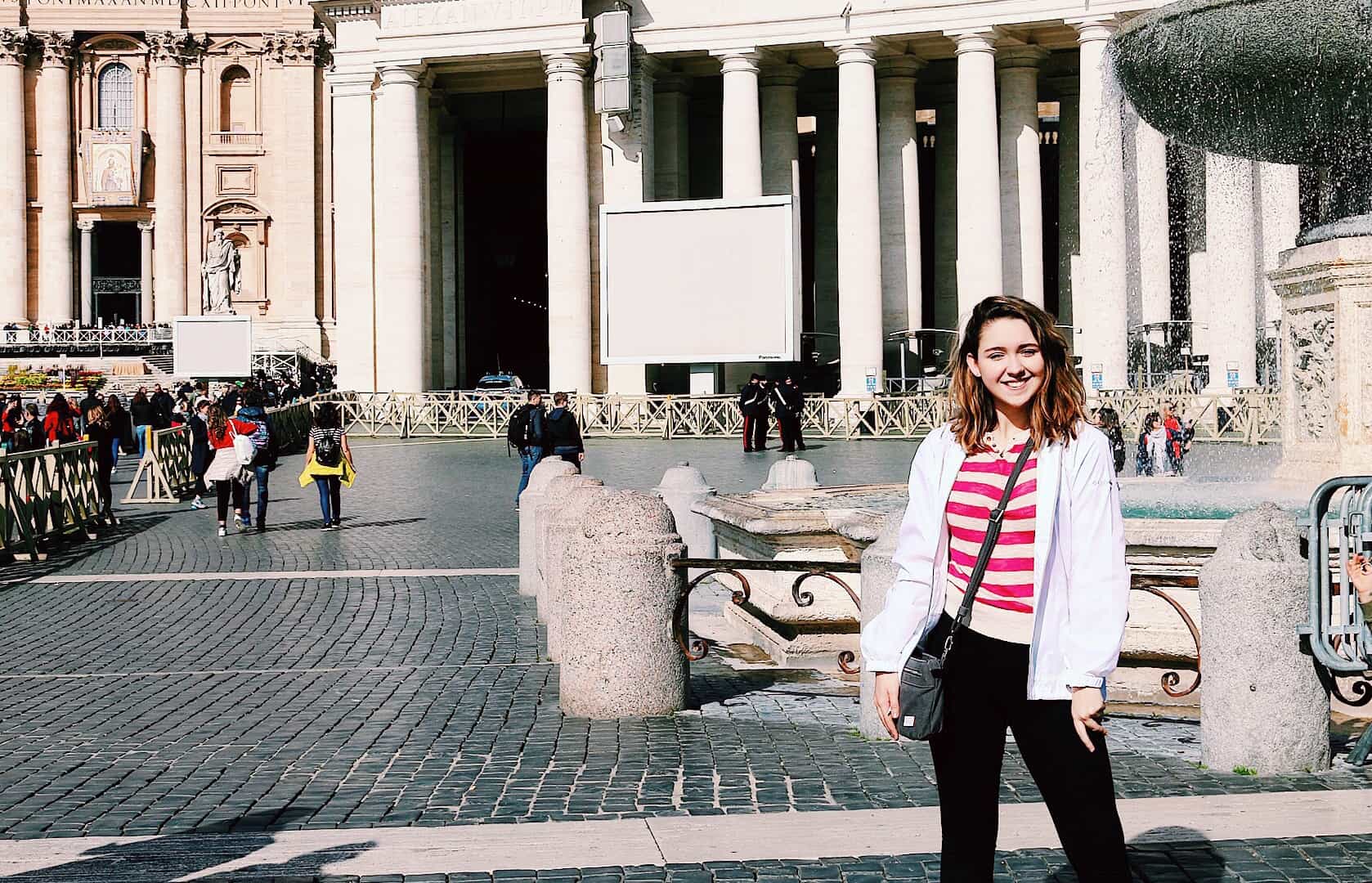 JWU student Katelyn Colantonio in front of a fountain in Rome