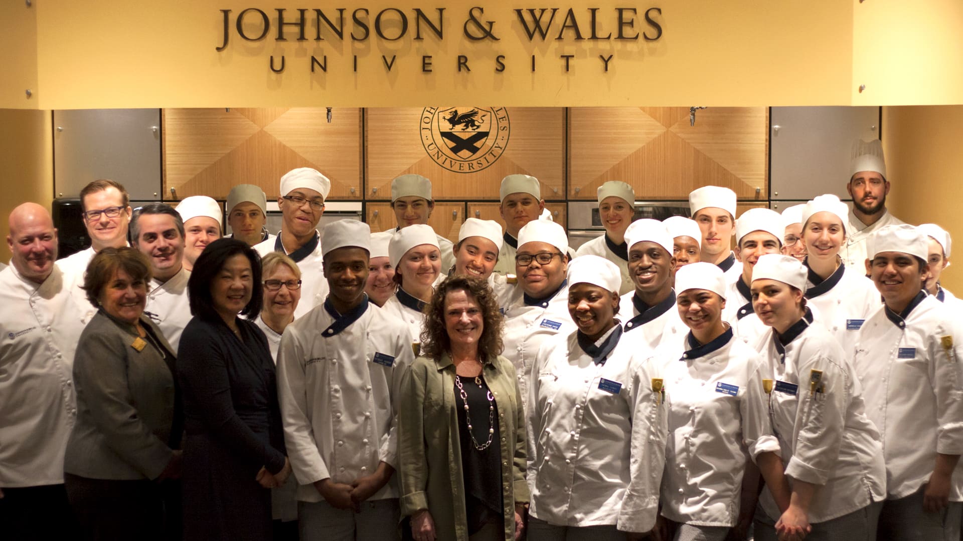 Vitamix CEO Jodi Berg poses with a group of JWU students, faculty and staff.