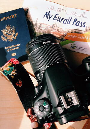 Travel necessities: camera, passport, Eurail pass
