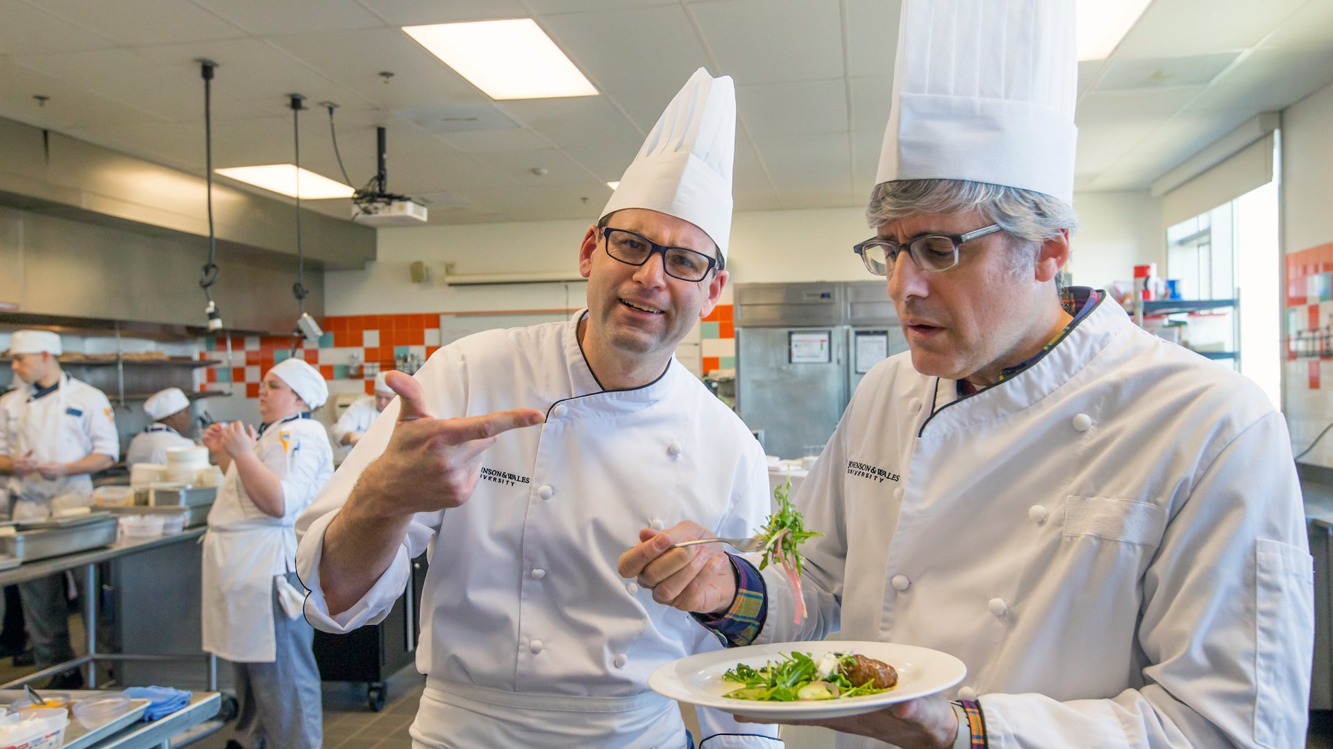 Chef Matthew Britt and Mo Rocca hamming it up for the camera