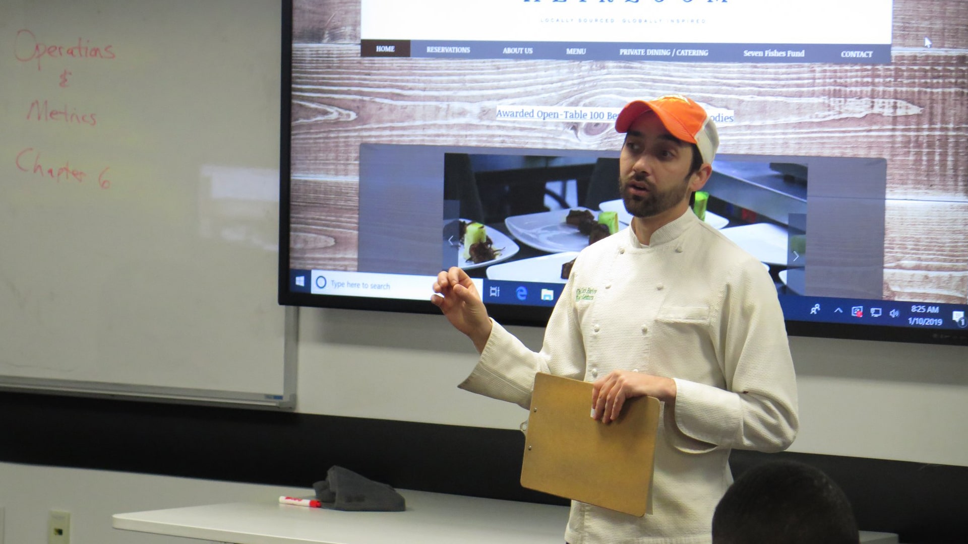 Clark Barlowe '09 speaking to JWU Charlotte College of Business students