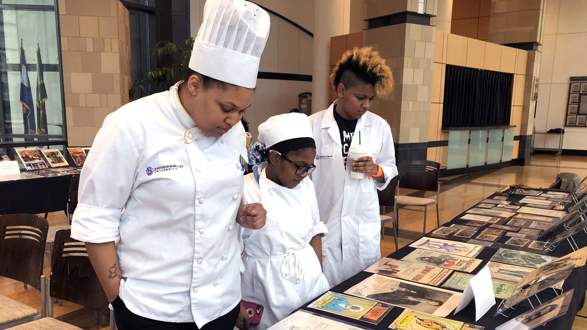 Students exploring exhibits at Black History Museum.