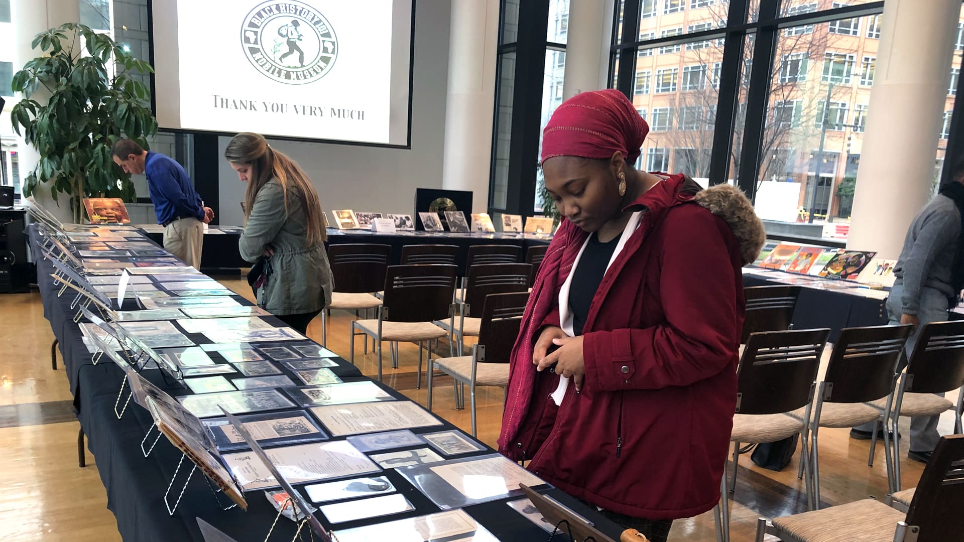 Students exploring exhibits at Black History Museum.