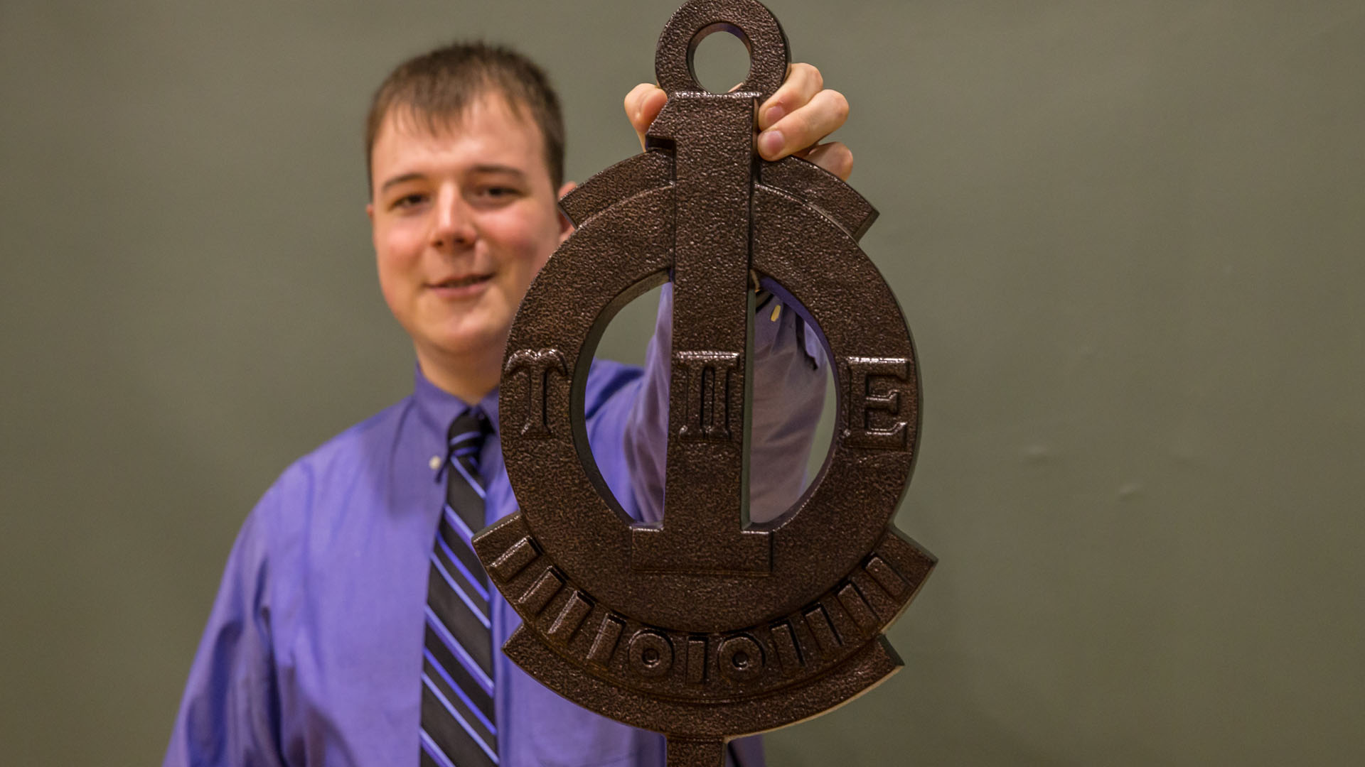 Dennis Collins shows off the UPE key.