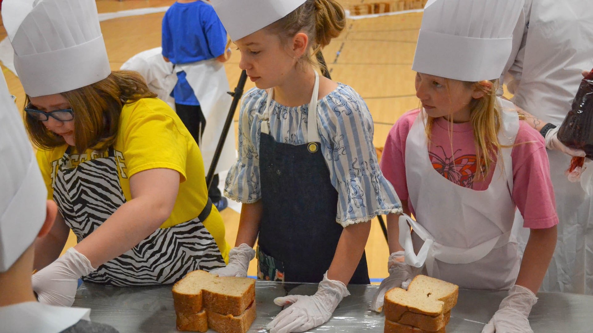 Students helping at the assembly.