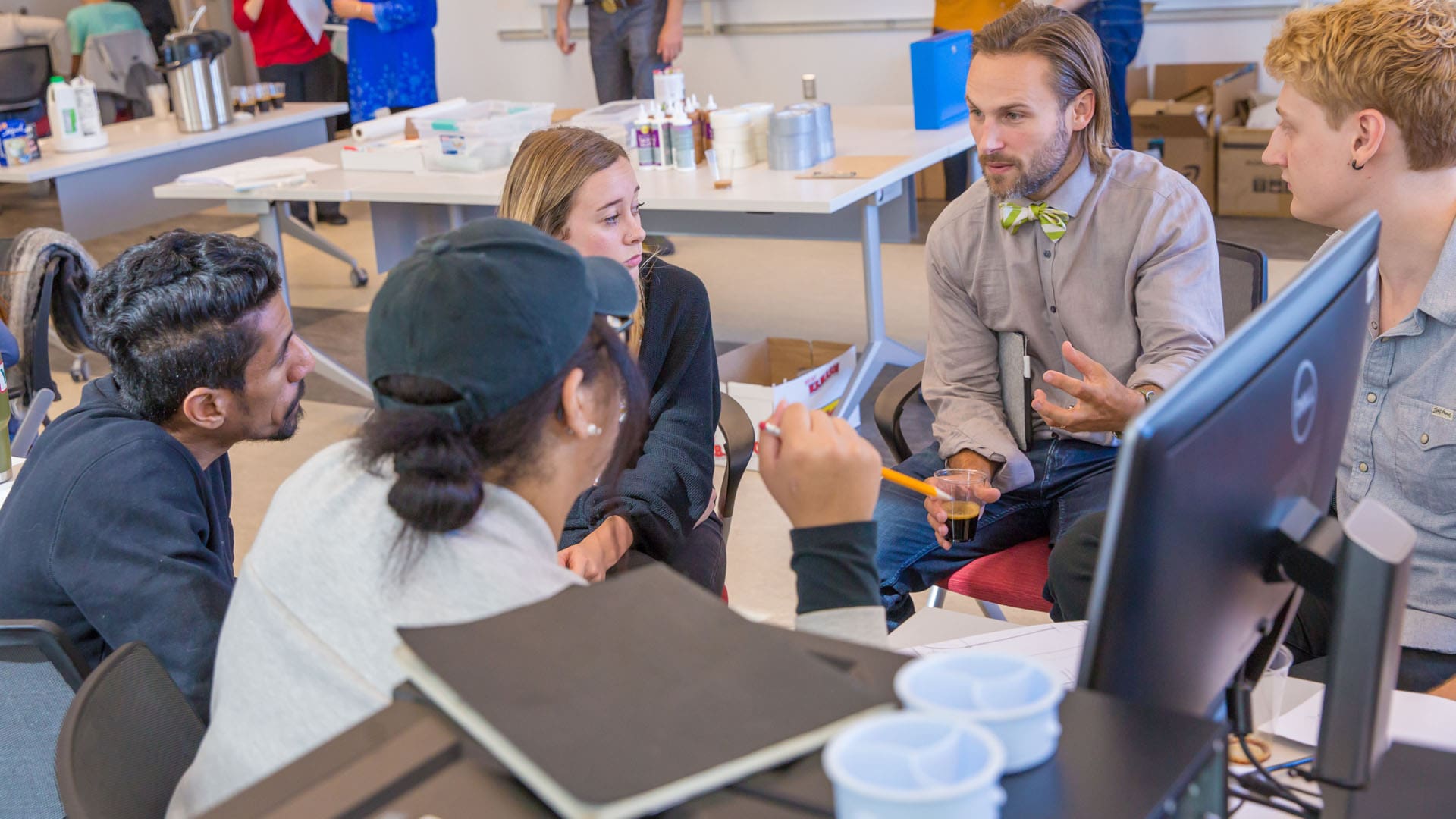 Faculty member Walter Zesk and students.