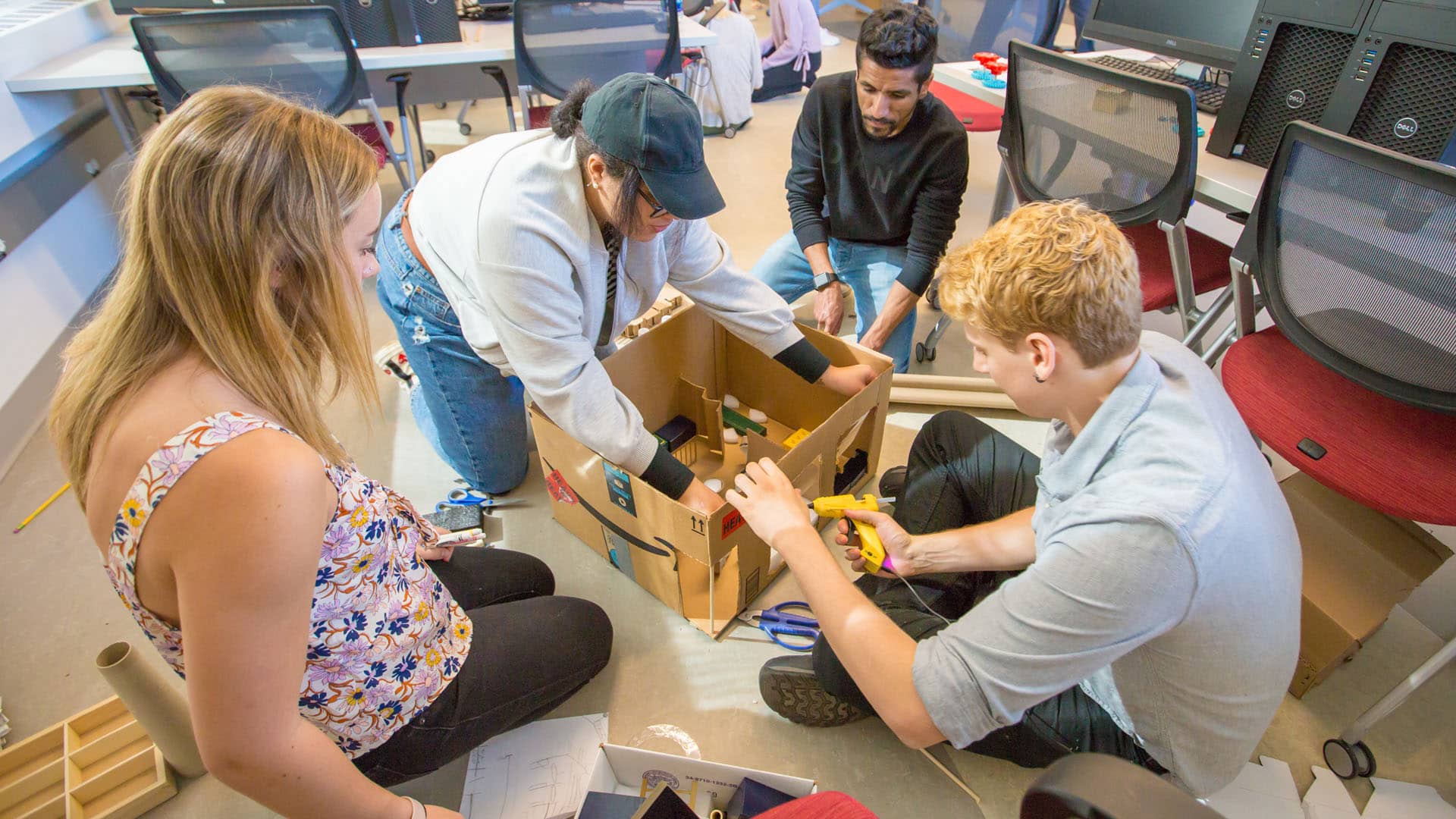 A student group works on their project.