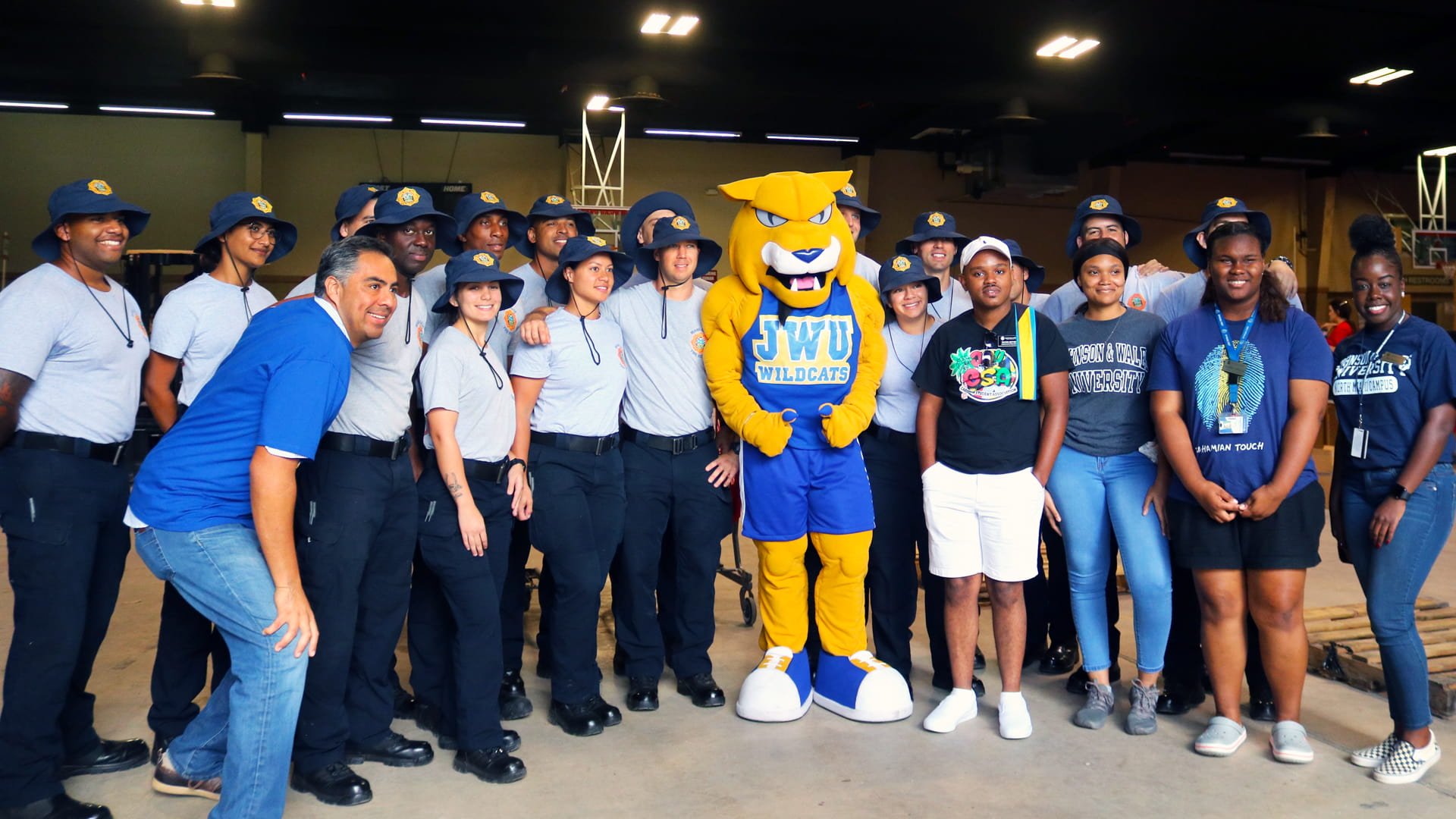 Group portrait of the JWU volunteers with the relief crew. 