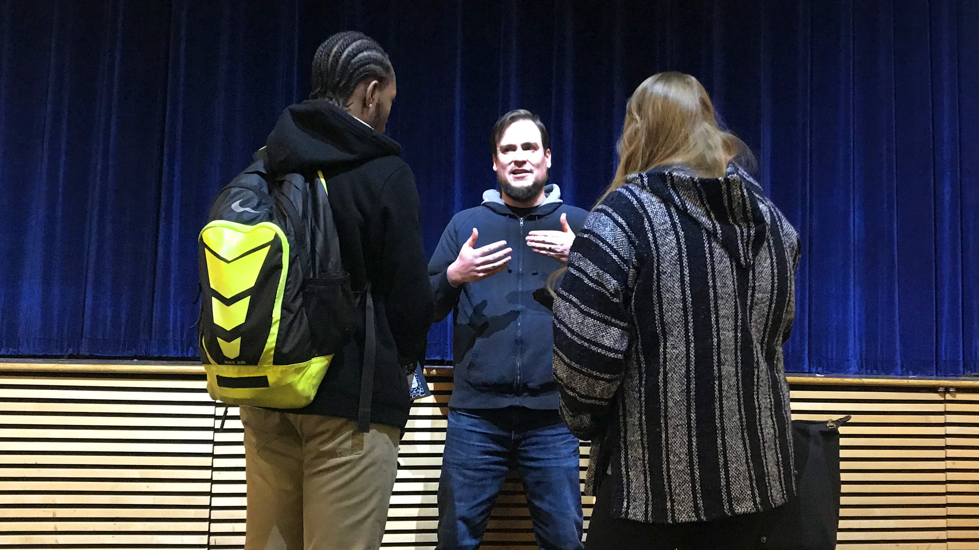 Saldarini chats with students after his talk.