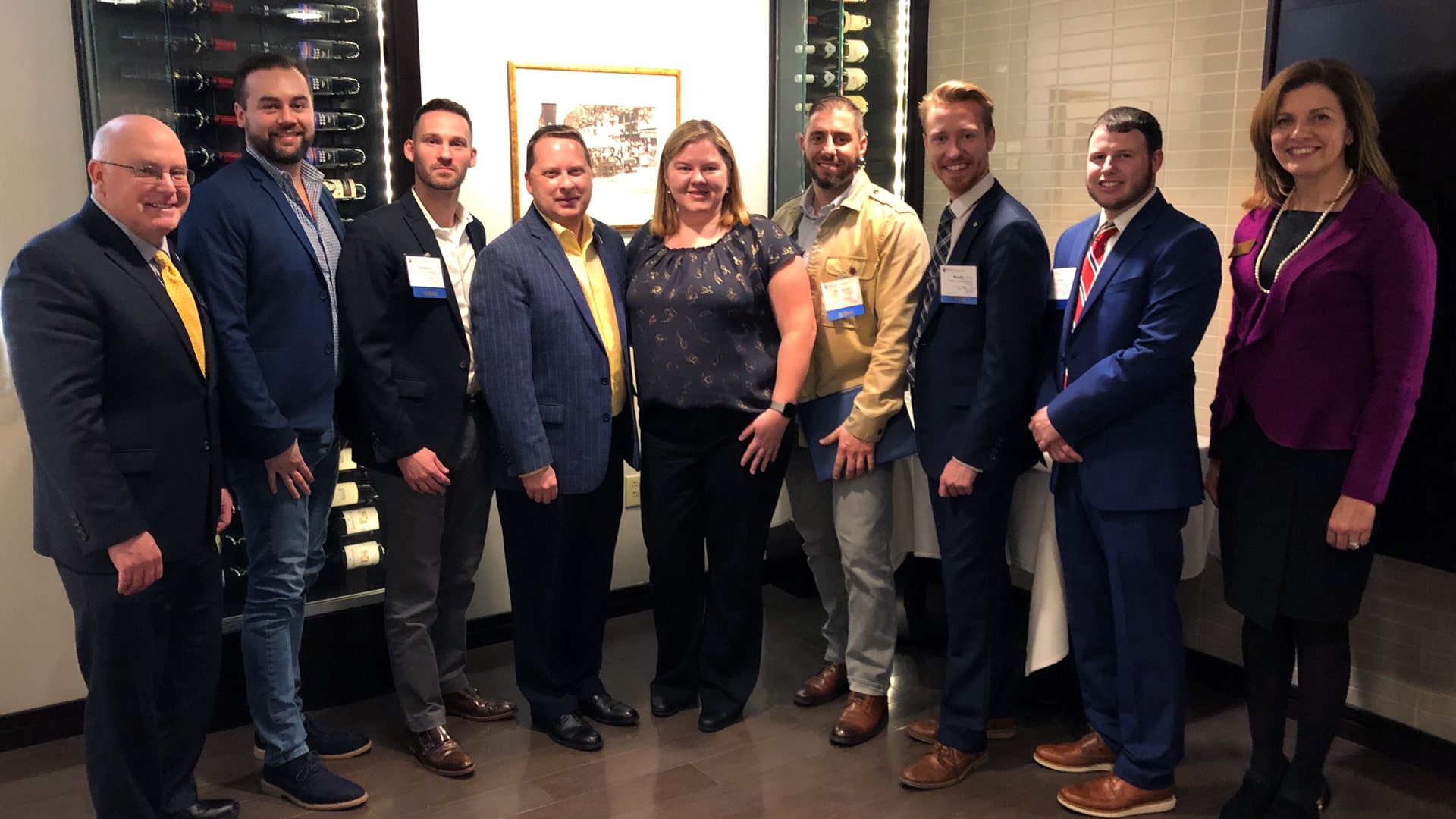 2020 Hospitality Alumni Leaders with Dean Paul McVety (left) and Providence Campus President Marie Bernardo Sousa