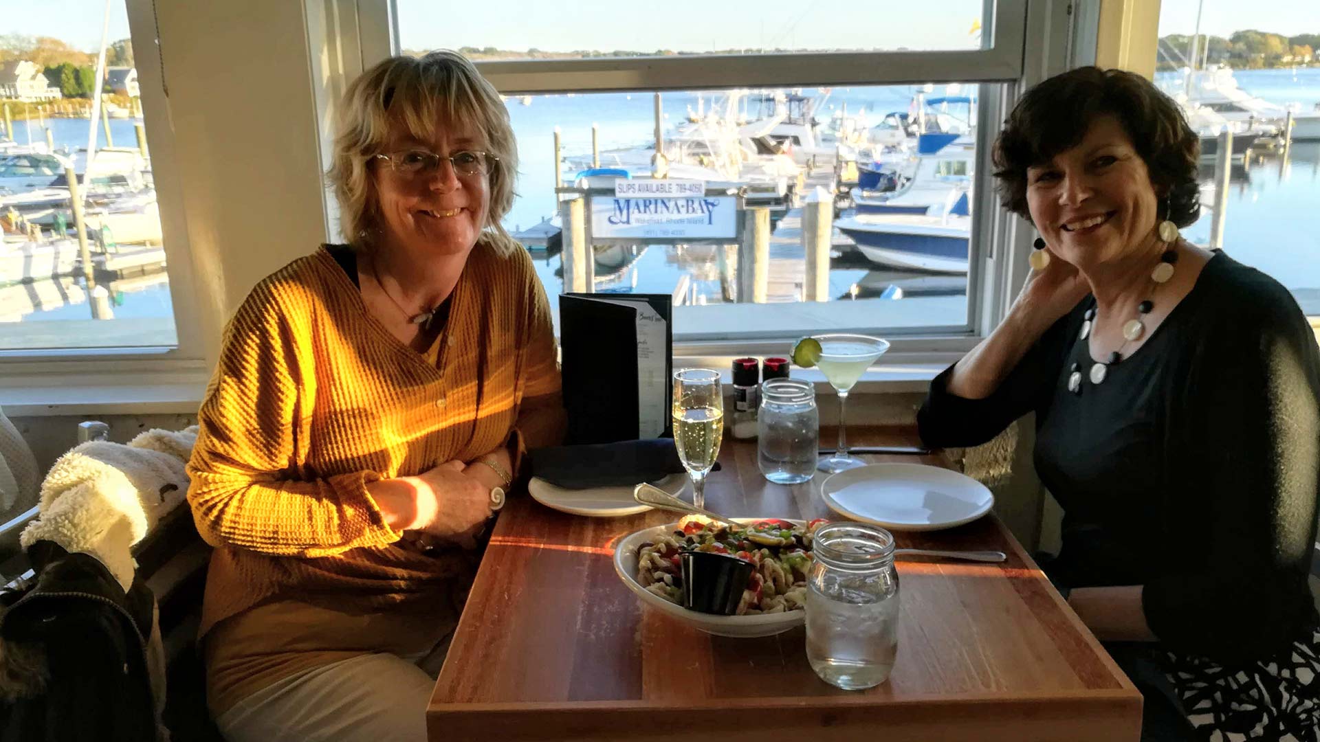 Palliser and Professor Marian Gagnon enjoying a meal in Narragansett