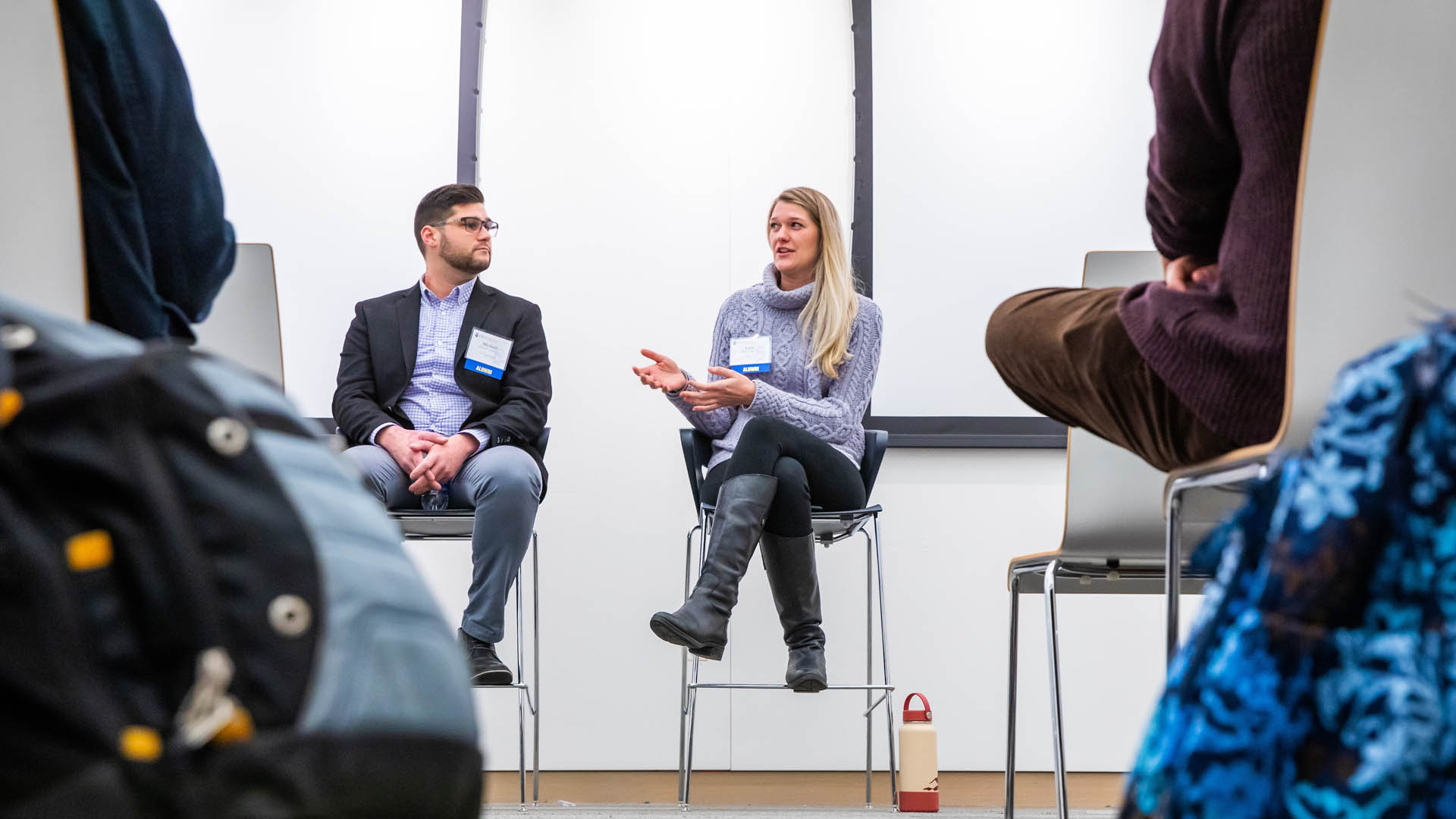 Michael K. Ferranti ’15 and Carly O'Keefe ’17 speak during the event.