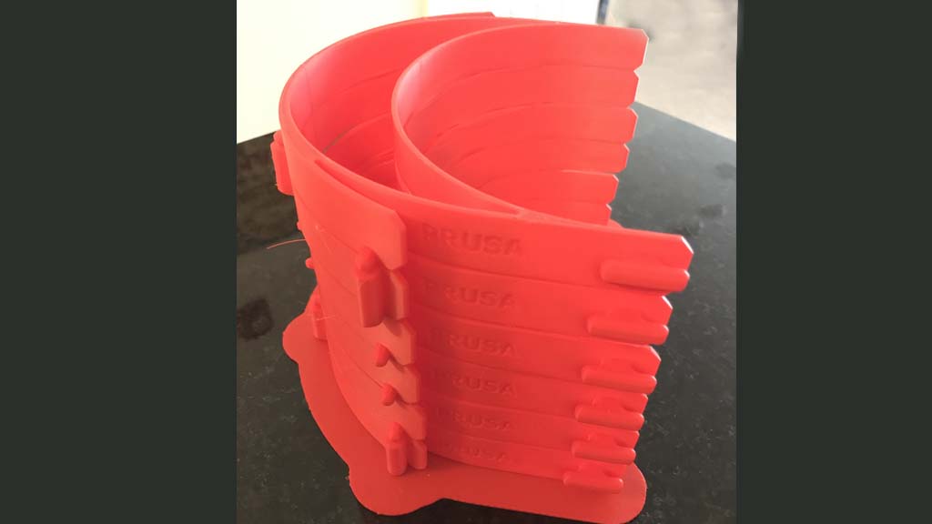 Provenzano has been printing face shield bands out of his house with a 3D printer.