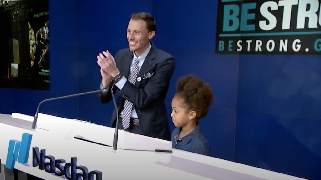 Michael Levine with student from Be Strong program at Nasdaq