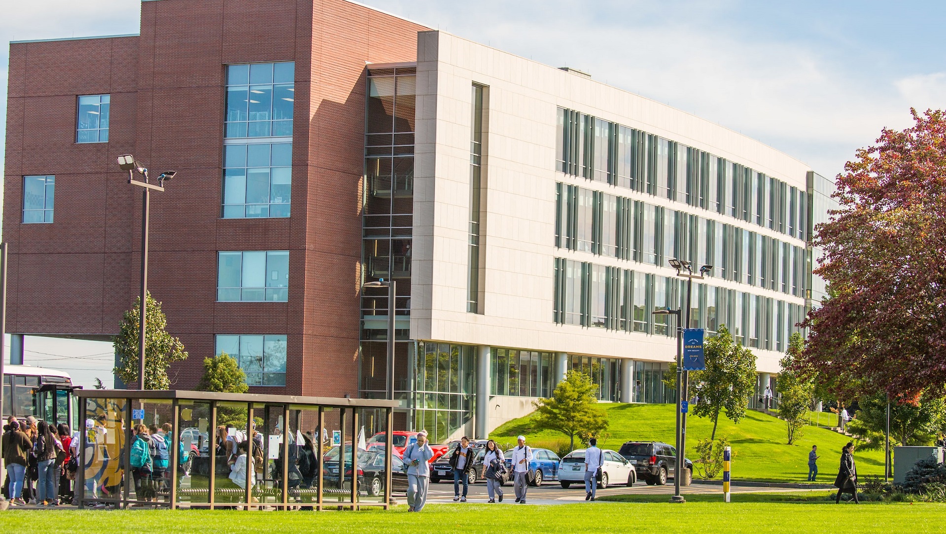 Students walking around Harborside Campus