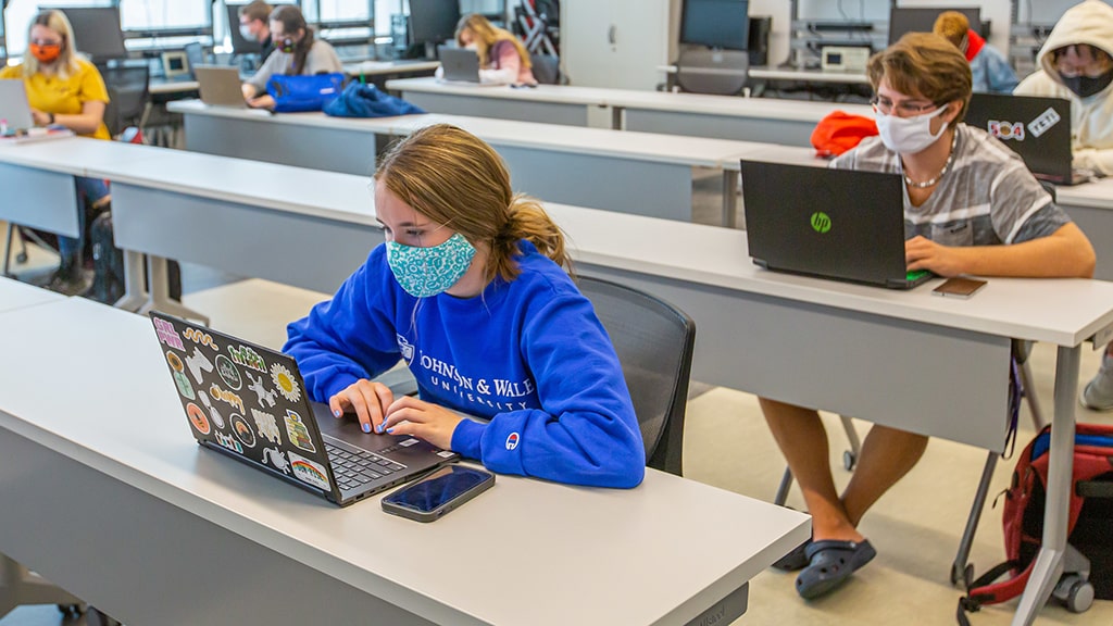 Image of students working in a classroom