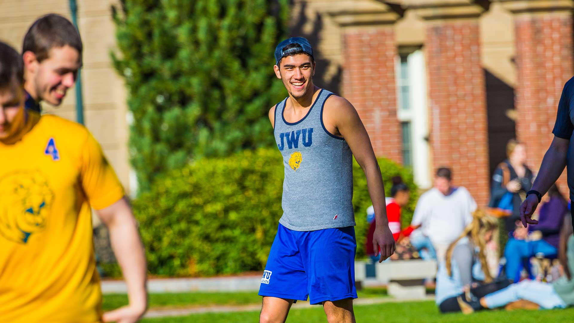 A JWU student wearing a JWU tank top