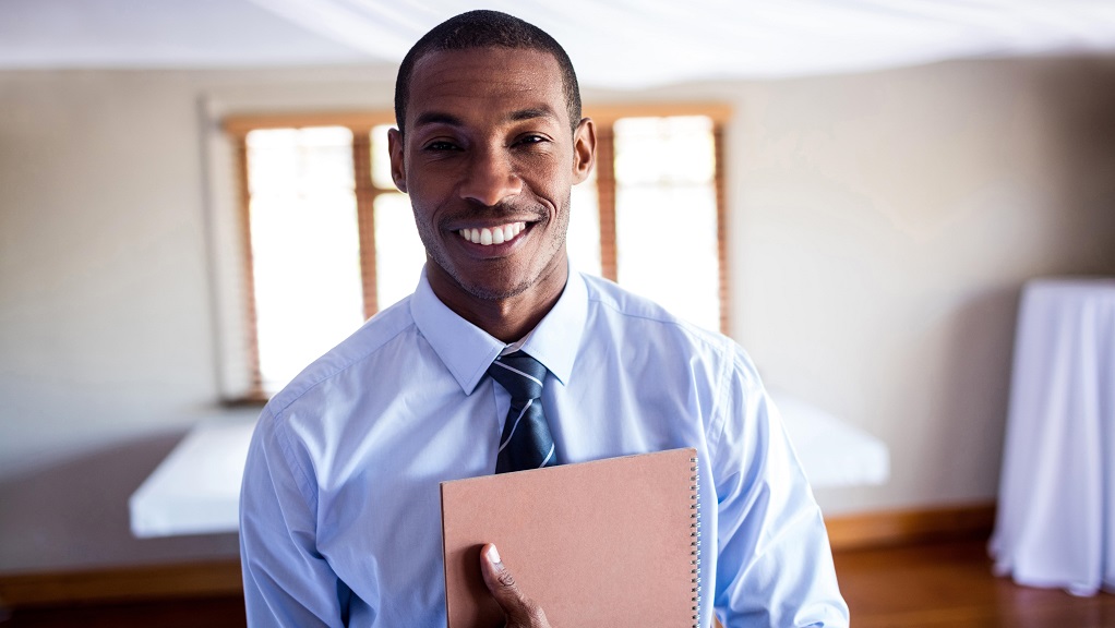 Smiling male manager