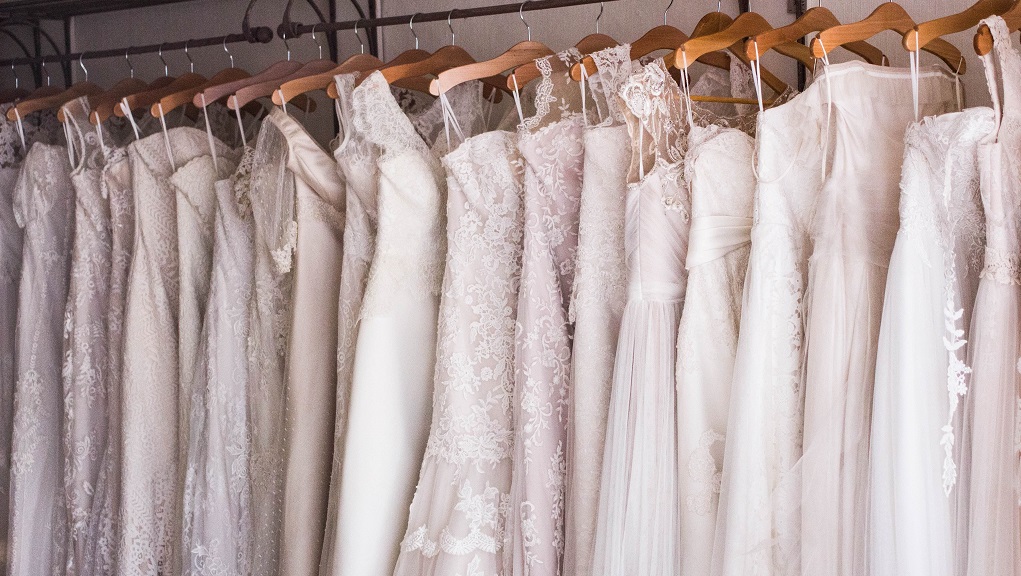 Row of white wedding dresses
