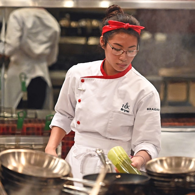 Alum Brynn Gibson '20 on the line on Season 20 of Hell's Kitchen. Photo: Scott Kirkland/FOX