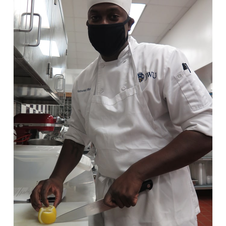 Nate Williams in the JWU Charlotte culinary lab. 