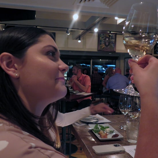 Wine appreciation: Emilie Fulcher ’22 testing a wine’s viscosity.