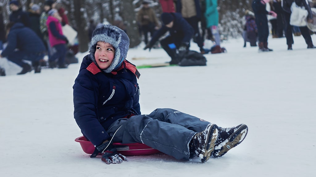 Kid sledding