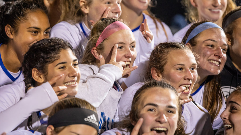 The JWU Women's Soccer team shares a Wildcats smile