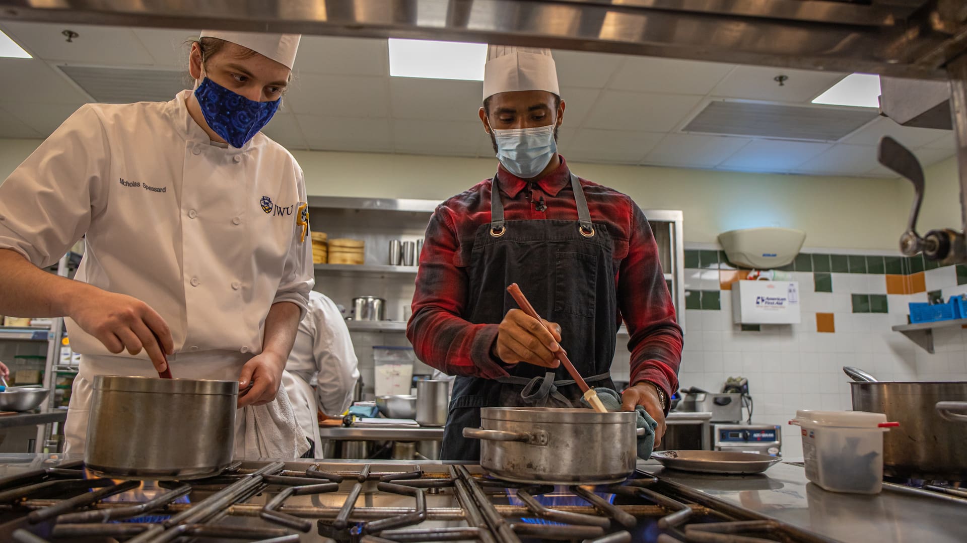 Patriots Pro Bowler Justin Bethel cooking at JWU Providence.