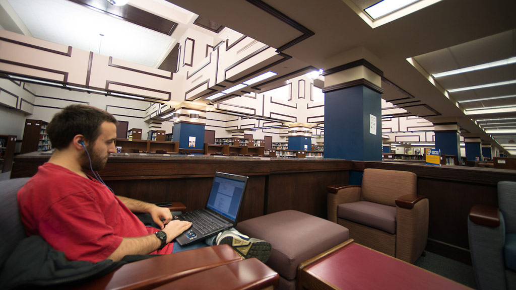 A student studying in the library